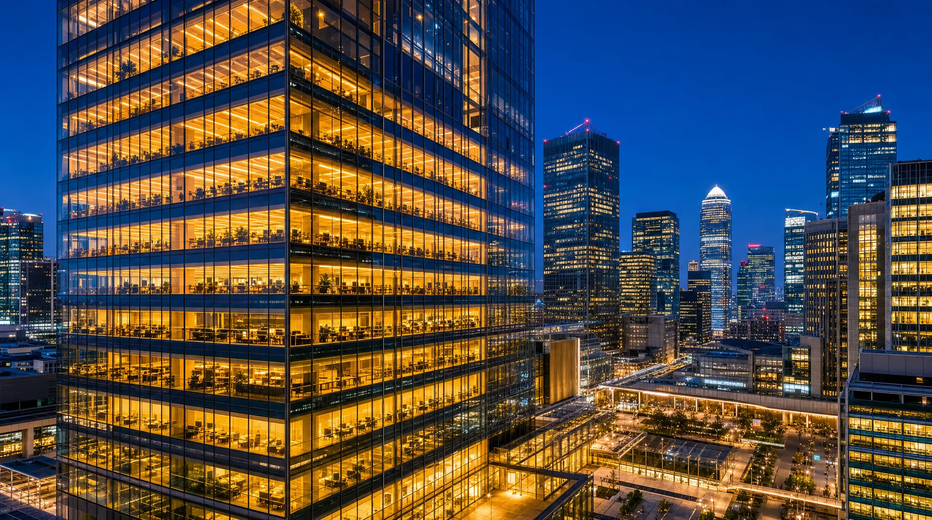 Skyscraper offices glow at dusk in a global expansion hub, reflecting corporate compliance readiness across business operations.